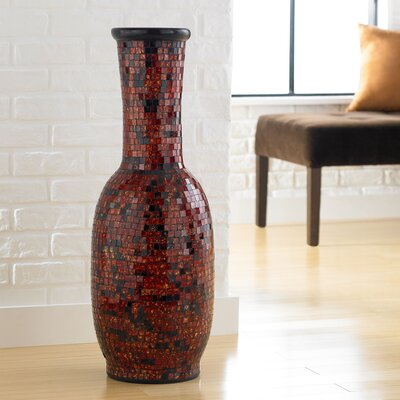 Like this colorful flareneck vase handcrafted from virtually unbreakable 